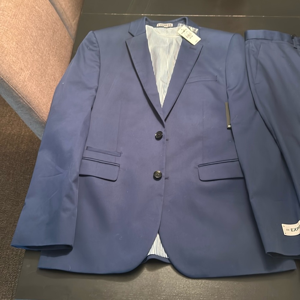 Express men’s navy two-piece suit, brand new never worn with tags. Slim fit